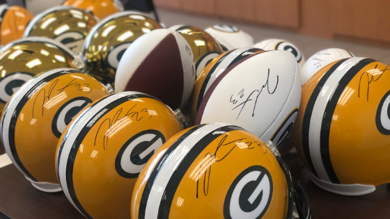 Green Bay Packers' Jaire Alexander signs autographs at the NFL