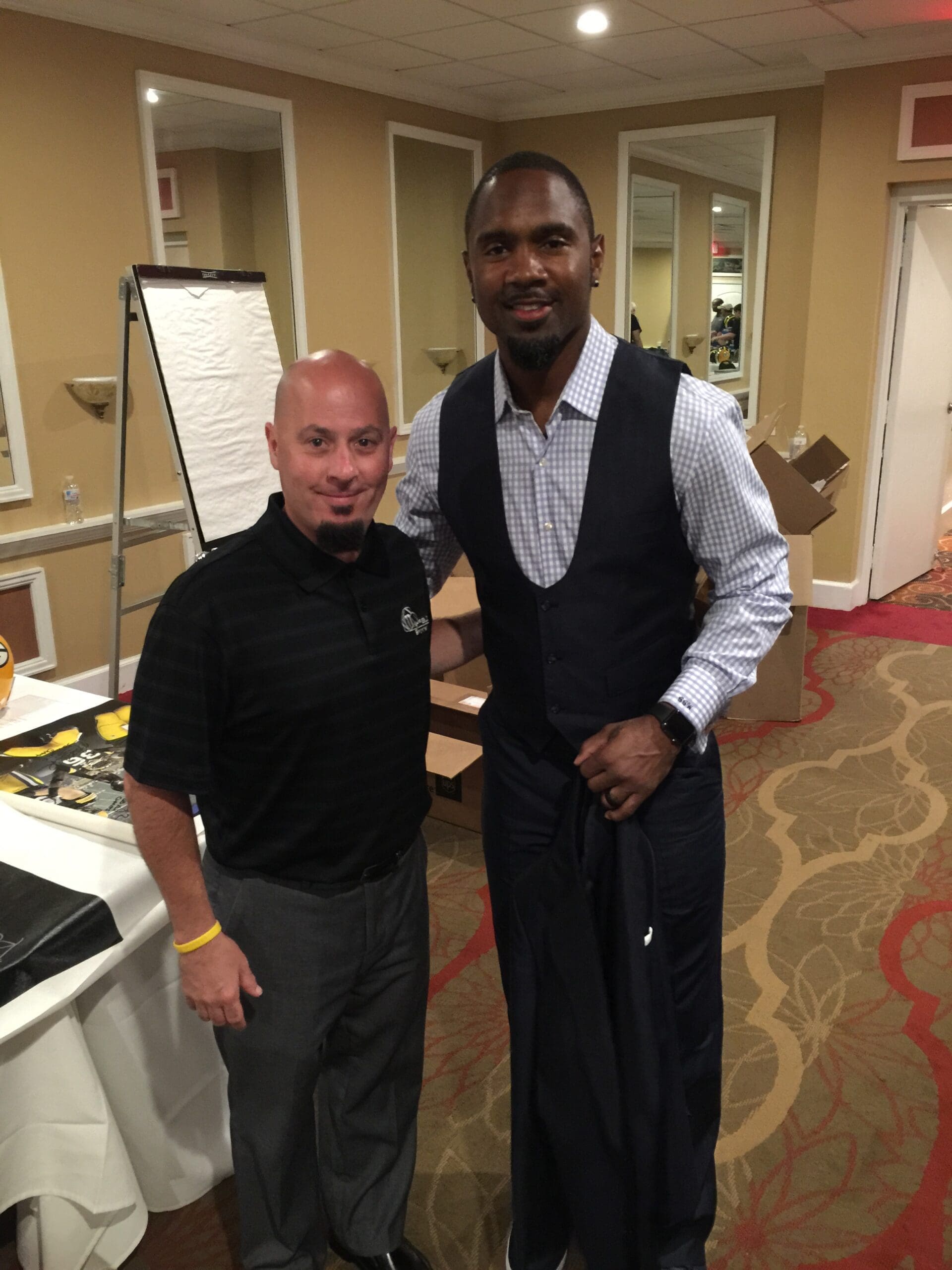 Mark Mayfield and Hall of Famer Charles Woodson at an event